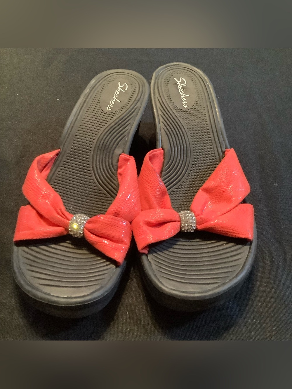 SKECHERS:  Women’s Tangerine Bow Slide Sandals